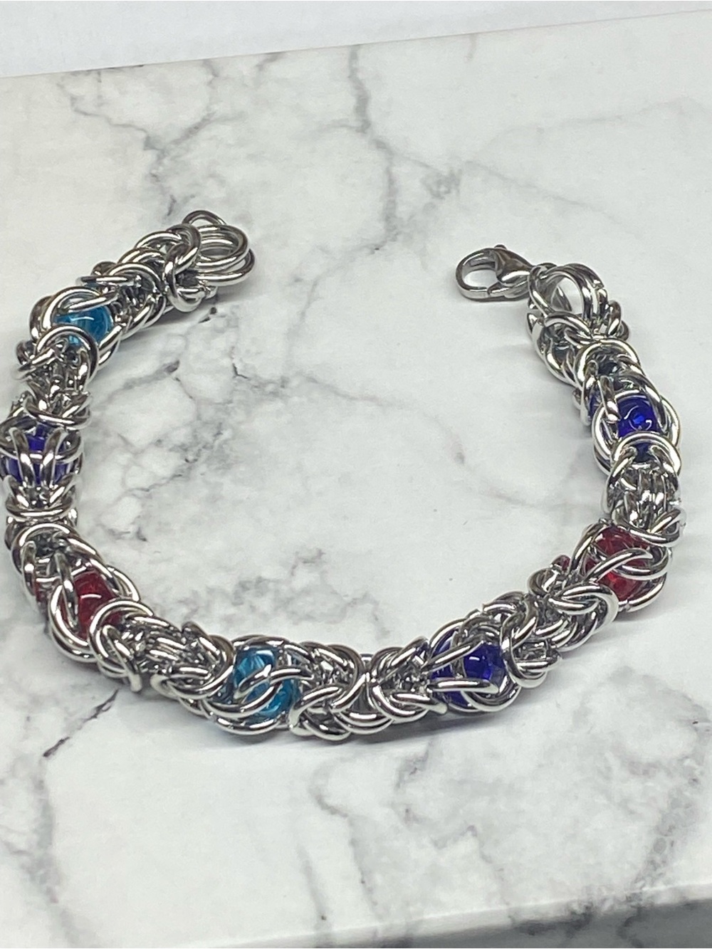 Silver-Tone Chain Bracelet with Blue, Purple and Red stones